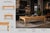 An extra-large French Provincial coffee table in its original blonde wood finish, featuring a beautifully scalloped apron...