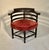 Antique robust corner, or roundabout accent chair made of rosewood and rosewood veneer, American made 1870-1880. Features...