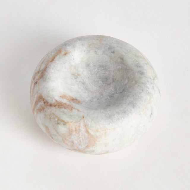 Honed to a semimatte finish, this stunning marble is specifically known for its unique lightBrown broad lines. The clay...