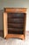 of a 19th-century French oak maid's cupboard. The height is 162 cm. The width is 117 cm. The depth is 51 cm. A drawer at...