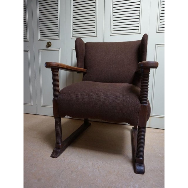 Brutalist Mid-Century Wing Armchair in the Manner of Charles Dudouyt 1950's Massif oak wooden Winged Armchair,from the...