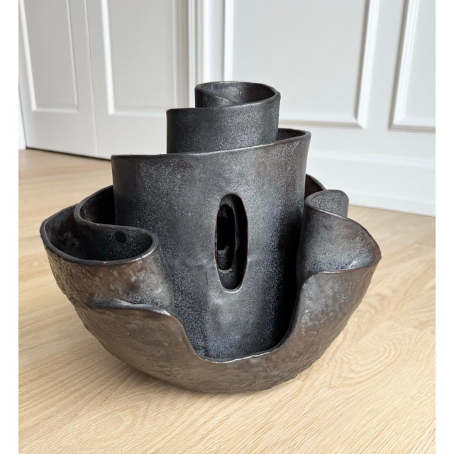 Exceptional monumental 1970s studio pottery sculpture featuring an organically coiled spiral form with striking...