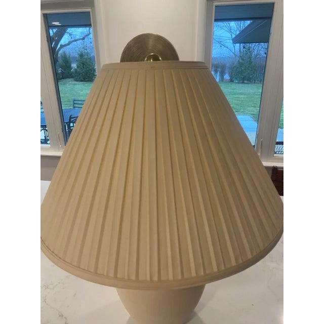 Oversized cream ginger jar lamp from Coronet. Made in California. Includes original brass finial and harp. No shade