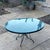 1970s 1970s Mid-Century Modern Woodard Style Black Wrought Iron Mesh and Glass Patio Dining Table For Sale - Image 5 of 6
