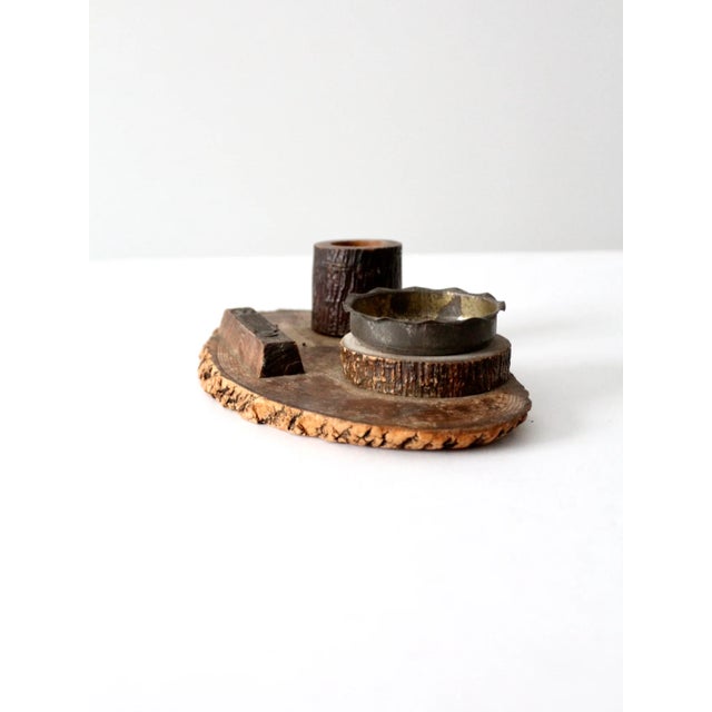 Elevate your cabin, lodge, or rustic-inspired interior with this vintage ashtray set, a charming example of mid-century...