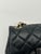 Extra Mini Black Chanel Flap Bag. Coveted icon in miniature form, this vintage Chanel Mini Classic Flap Bag embodies...