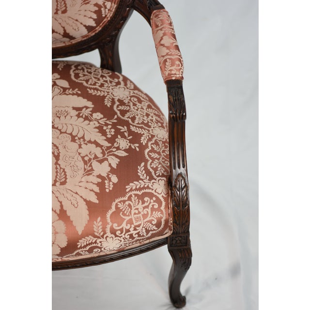 Pair of 1920s antique Louis XV-style chairs reupholstered in new Scalamandre Firenze Silk Damask. Fiber Content: 76%...