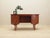 The desk was made in the 1970s, Danish production. The structure and the top are covered with teak veneer. The legs are...