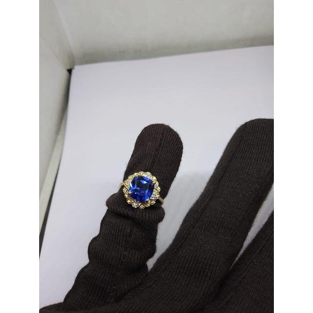 Gemstone details Gold Purity: 18K Solid Gold Blue sapphire: 3.60 cts Diamond: 0.20 cts 18K gold Gross weight: 4.40 grams...