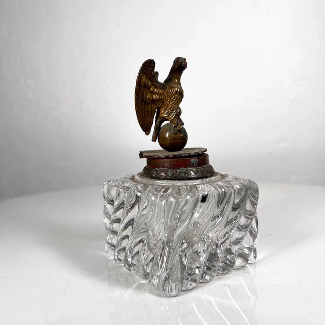 For your consideration, an antique vintage cut crystal inkwell brass eagle top. Dimensions: 5.25 H x 3 D x 3 W Preowned...