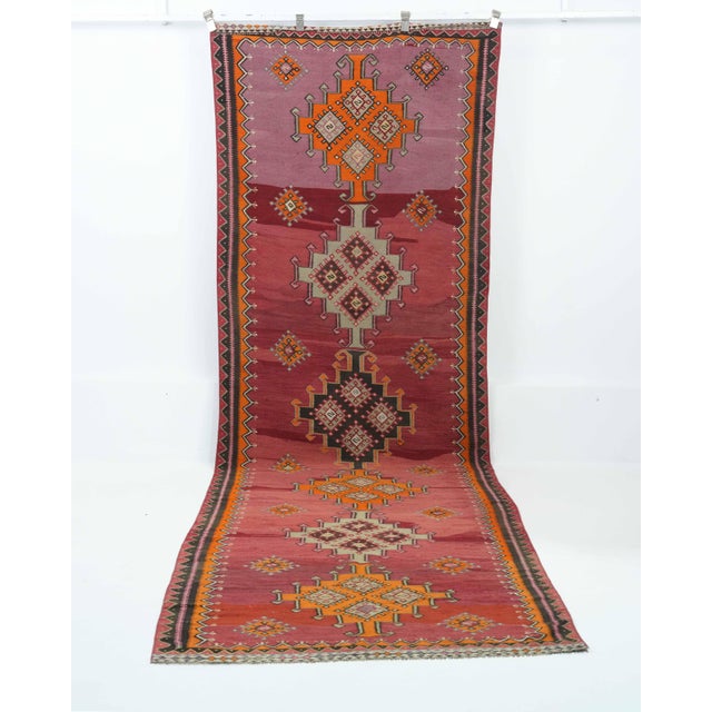 Vintage Turkish Hand-Knotted Runner rug is a semi-antique vintage runner rug. The '70s Eastern region of Anatolian's...