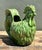 Invite a touch of rustic French elegance into your home with this striking pair of vintage rooster cache pots. Masterfully...