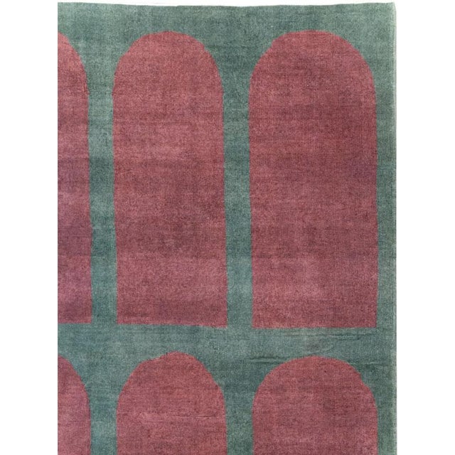 This Mid-20th century Turkish Art Deco Style room-size carpet presents a bold, highly ordered composition of fifteen...