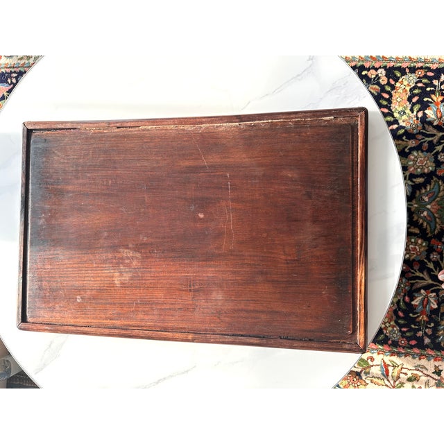 A striking antique Vietnamese hardwood tray dating to the late Nguyễn Dynasty / early French Colonial period, circa...