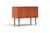 A charming and versatile 1960s Danish drop front cabinet by Lyby Møbler in warm solid teak. The drop front panel opens to...