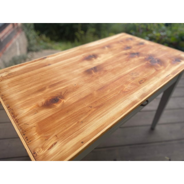 We've given this charming antique table a fresh coat of paint, sanded the surface, and oiled it. Width: 112.5 cm Depth:...