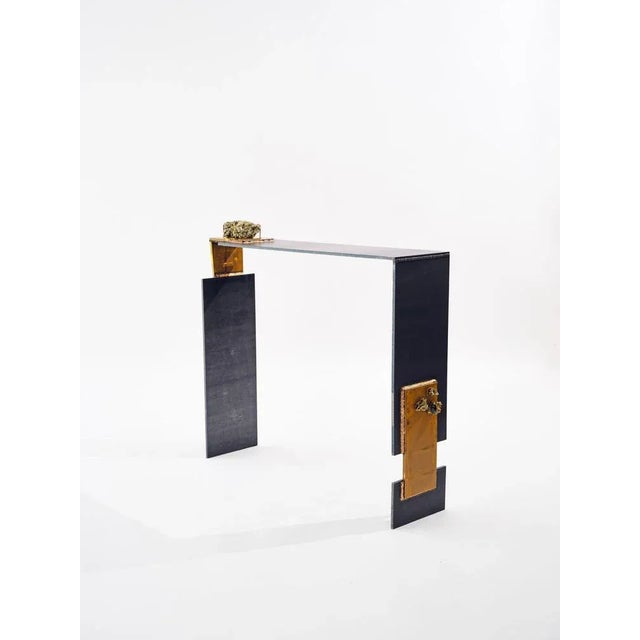 Pyrite consolte table 2 by brajak vitberg dimensions: d 145 x w 25 x h 85 cm materials: metal, brass, natural pyrite...