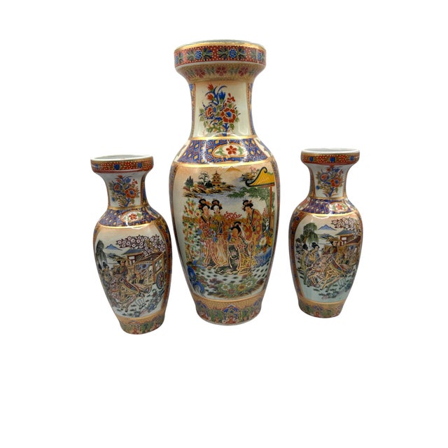 Vintage 3-piece Satsuma-style ceramic vase set. This matching trio features one large center presentation vase and two...