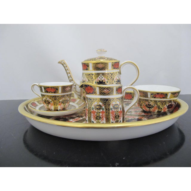 Royal Crown Derby 'Old Imari' pattern full miniature tea set and tray, no. 1128. Includes the following: Oval Tray - 7...
