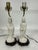 Nice pair on petite porcelain Asian style figural lamps. Lamp shades ore not perfect, but can be included free of charge .