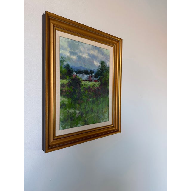 Beautiful vintage impressionist landscape oil painting depicting a picturesque red farmstead nestled among lush green...