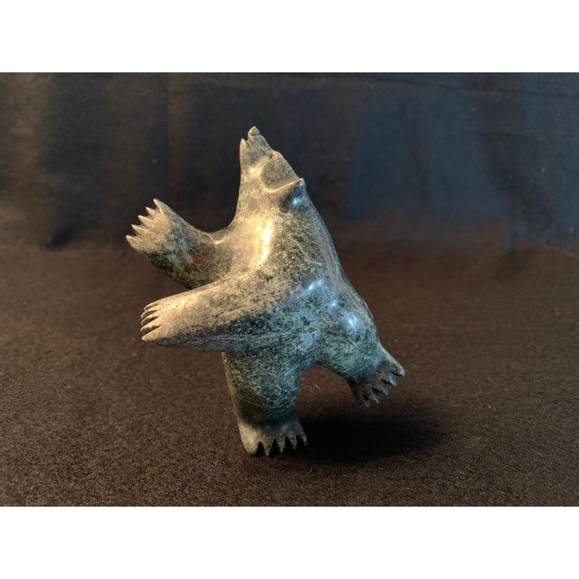 This is a stunning, authentic hand-carved Canadian Inuit sculpture titled "Dancing Bear" by the acclaimed Kinngait (Cape...