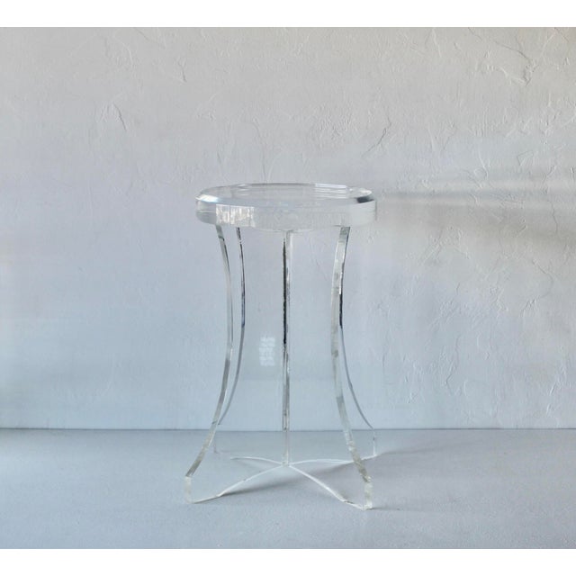 A fabulous Dorothy Thorpe Style Circular Seat "X" Base Heavy Lucite Acrylic Stool. Thick circular seat with a beveled edge...