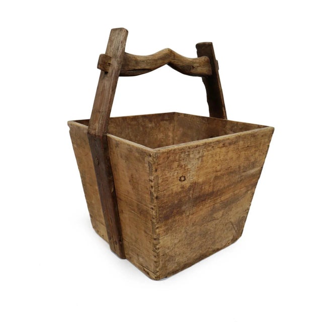 Old elm wood village bucket from northern China. Beautiful aged patina with signs of age and use. Each is unique in handle...