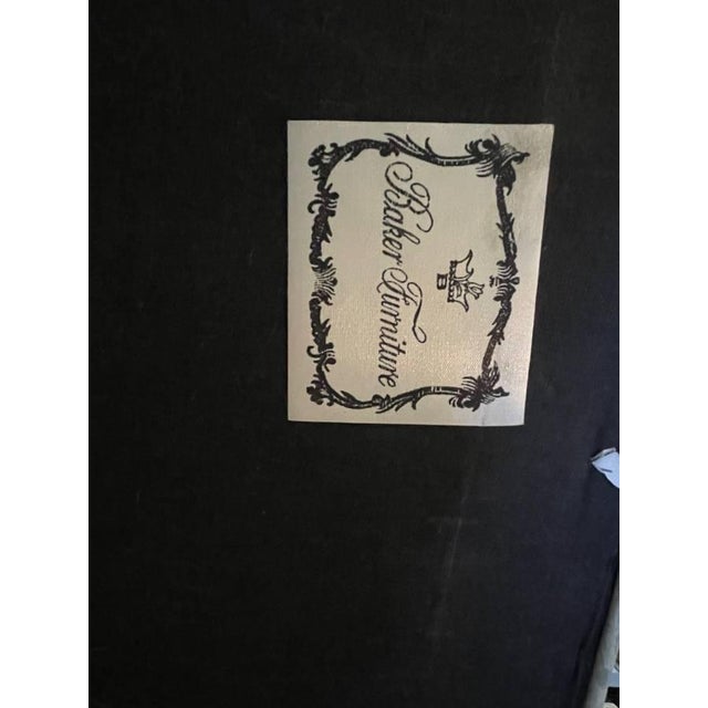 Elegant Baker Furniture Bergere vintage style chair with matching ottoman, the chair is covered in exquisite fabric and...