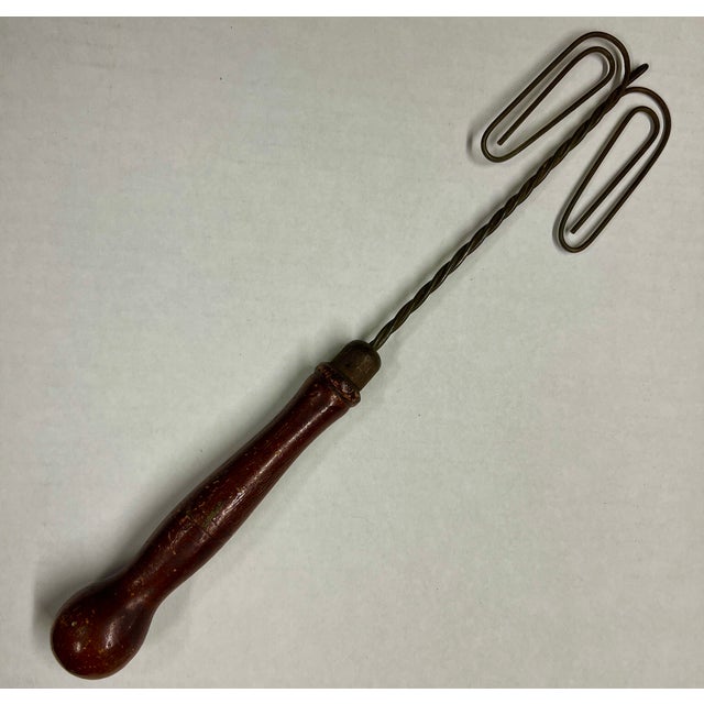 Wonderful antique egg beater for decoration. Wire and wood.