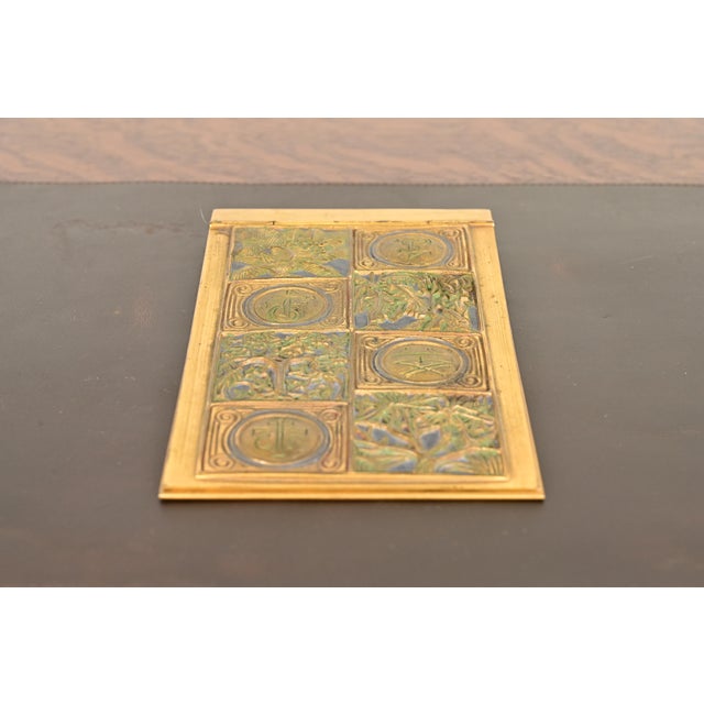 A gorgeous antique Arts & Crafts or Art Nouveau period "Bookmark" pattern gilt bronze and enamel notepad holder By Tiffany...