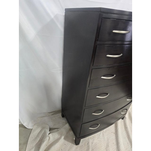 A refined modern tall chest by Stickley, crafted in the United States and finished in a rich espresso tone. This piece...