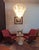 The chandelier is in perfect vintage condition and fully working. The metal has wear consisting in age and use; the glass...