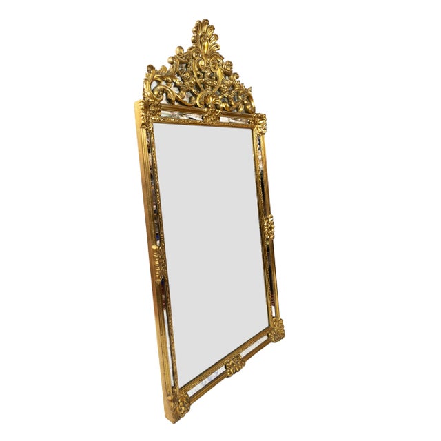 Vintage Italian richly decorated composite frame and gold colored mirror. Very good vintage condition.