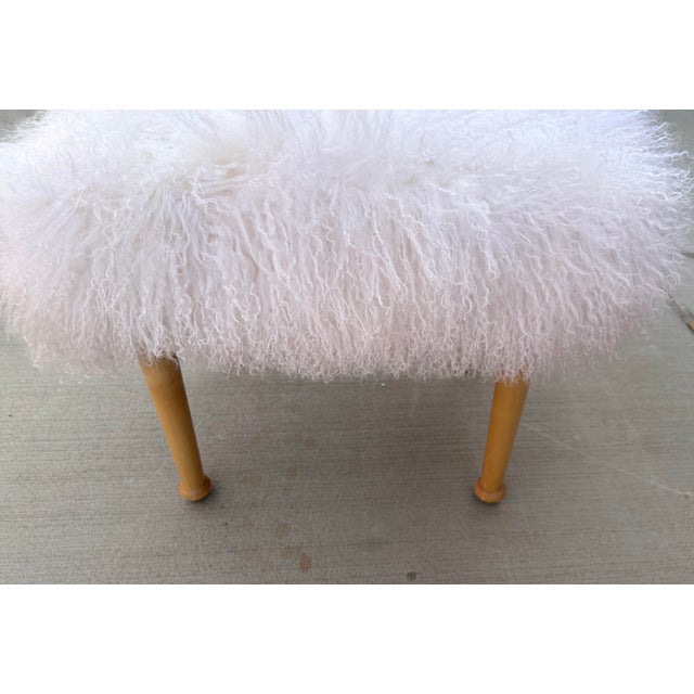 Anthropologie Mongolian sheep wool creates a fabulously fuzzy, infinitely glam, superbly cozy respite. Display at the foot...