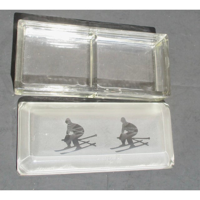 Heavy Glass desk box with two inner compartments and etched silhouette skiers on the lid. A heavy, smooth lid with soft...