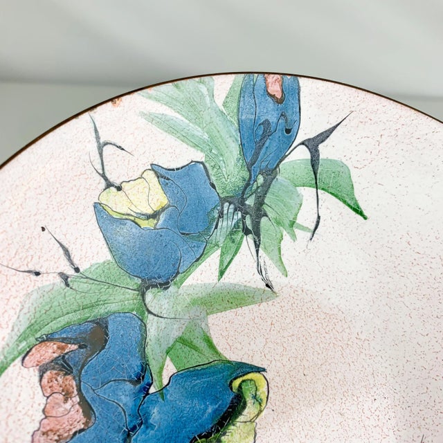 One of a kind vintage enamel bowl from Massachusetts artist Lilyan Bachrach. Beautiful hand painted floral motif inside...