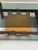 Wengé frame with a cognac-yellow-brown leather magazine holder and a smoked glass top. The table features a sturdy piece...