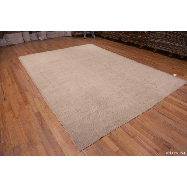An Extremely Decorative and Versatile Ivory Cream Minimalist Solid Abstract Modern Room Size Area Rug, Country Of Origin:...