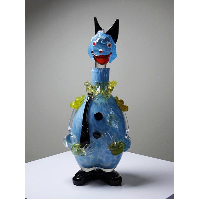 A rare and beautiful collector's set of three large Murano glass clown decanters or bottles, made in Italy and dating from...
