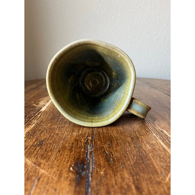 Matt Wright Studio Pottery Mug Signed and dated 2019 Green Color and Ribbed, Dented Design 5 3/8” width, 4” depth and 4”...