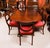 This is an elegant antique George III Regency Period mahogany dining table, dating from Circa 1780 and a set of ten...