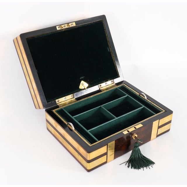 This is a very fine antique victorian brass bound gonçalo alves jewellery casket of the highest quality and condition by...