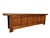 This low 19th century sideboard is made from solid poplar wood with a warm, weathered golden-brown finish. The low-profile...