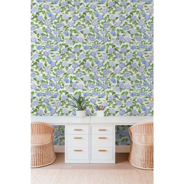 Our Hydrangea Blooms Botanical Wallpaper began as a hand-painted watercolor, with each petal added one by one to capture...