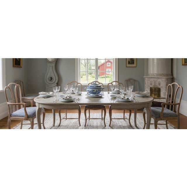 This is such a lovely set! The eight chairs have been newly upholstered in a blue and white medallion print. The cerused /...