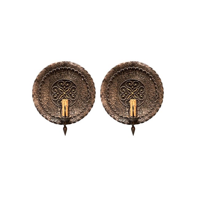 This striking pair of Italian wall sconces, dating back to the 1970s, perfectly embodies the rustic and brutalist charm of...