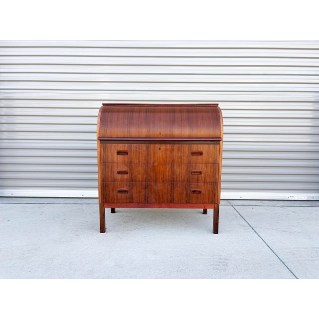 ✨ Danish Modern Rosewood Roll-Top Writing Desk ✨ This exceptional Danish Modern writing desk, expertly designed and...