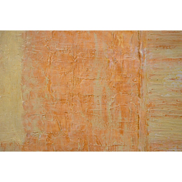 Abstract expressionist oil painting depicting an orange and yellow geometric canvas with subtle highlights of red and...
