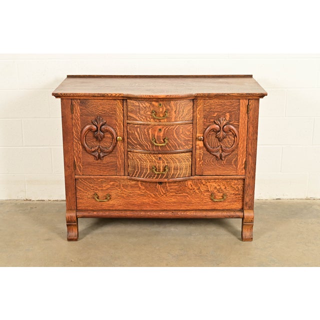 A gorgeous antique Victorian or American Empire dresser, sideboard, buffet server, or bar cabinet In the manner of R.J....